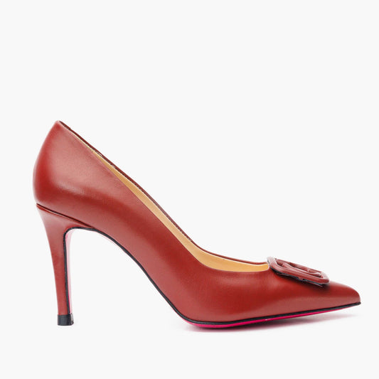 Zapato de salón de piel color rojo oscuro con suela fucsia para mujer Maneadero 