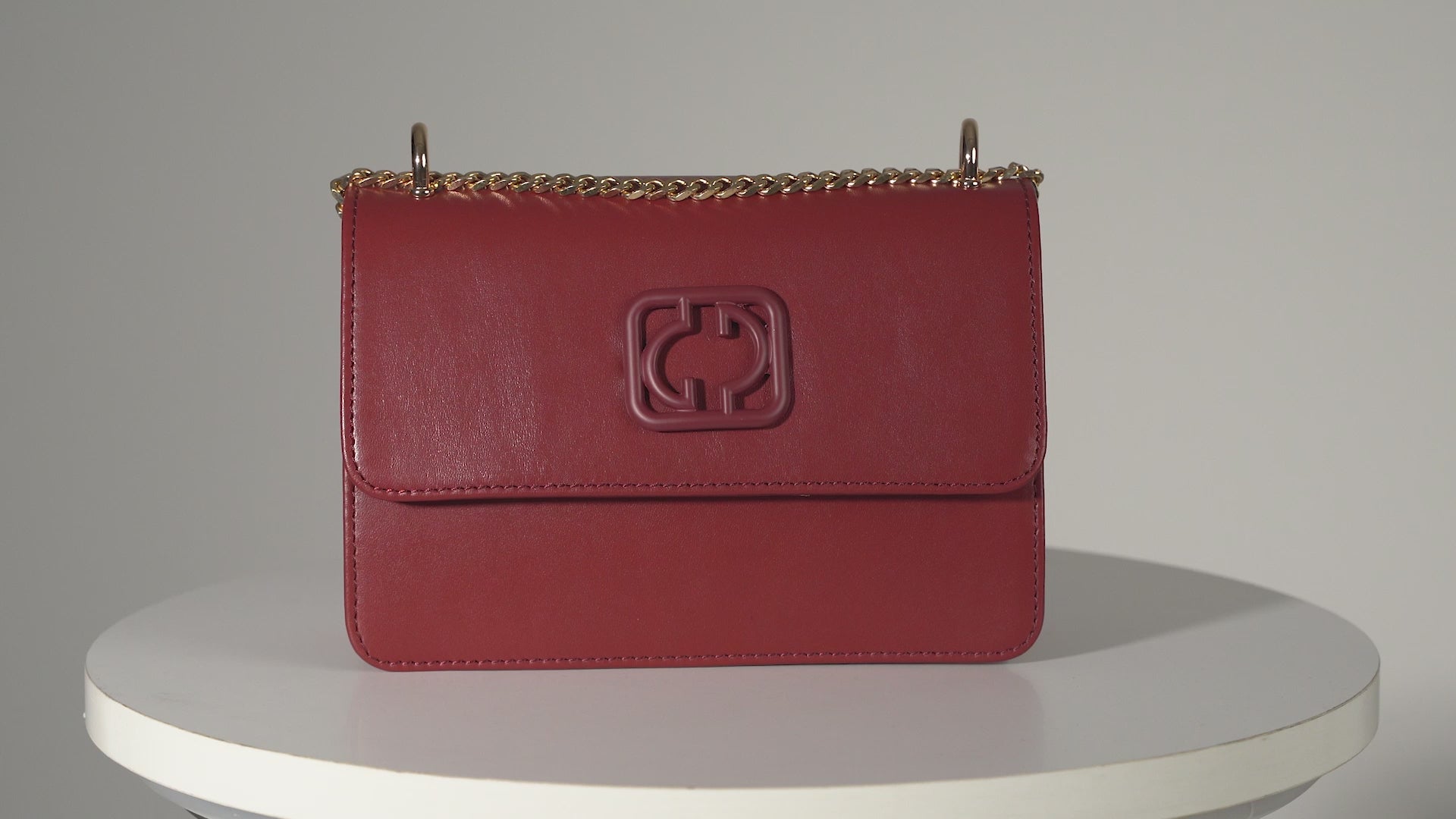 Dark red leather on sale handbag